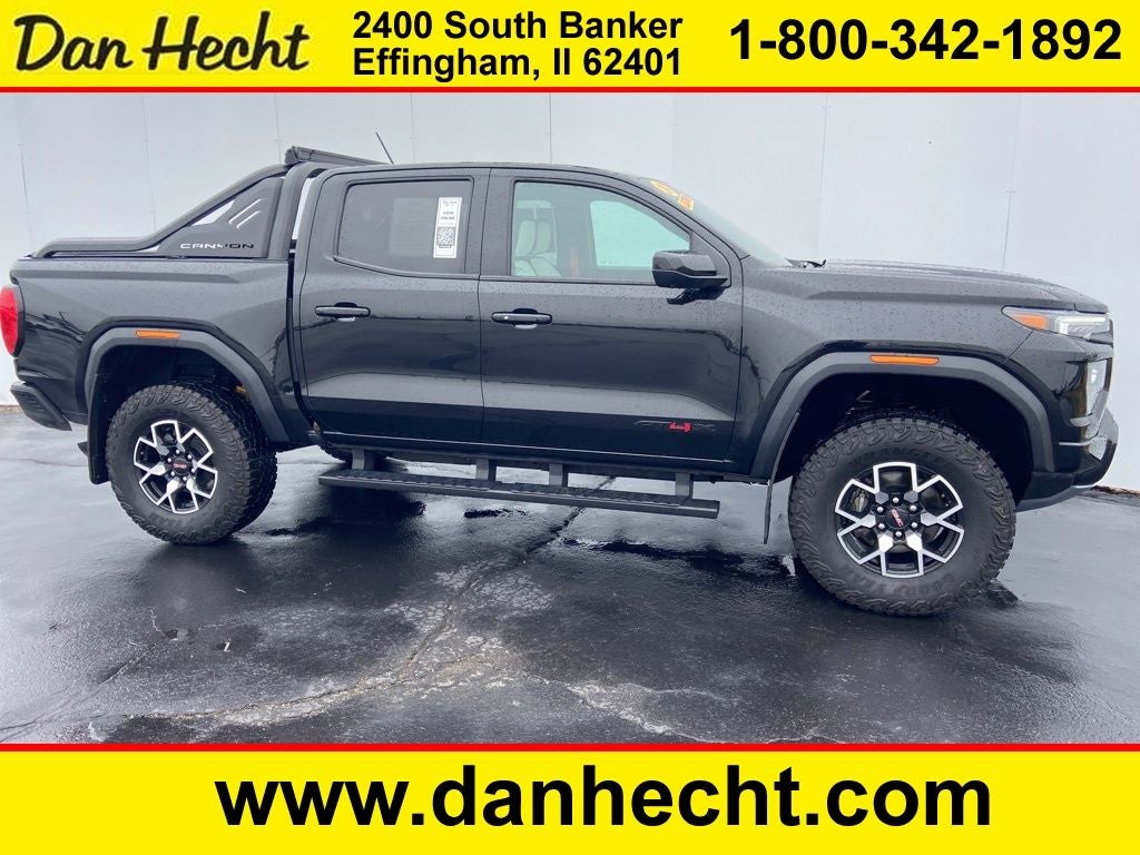 2024 GMC Canyon AT4X in Onyx Black — front three-quarter view