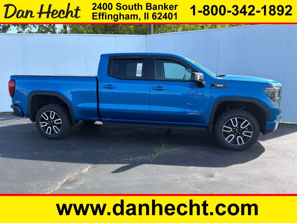 2024 GMC Sierra 1500 AT4 in Dynamic Blue Metallic — front three-quarter view