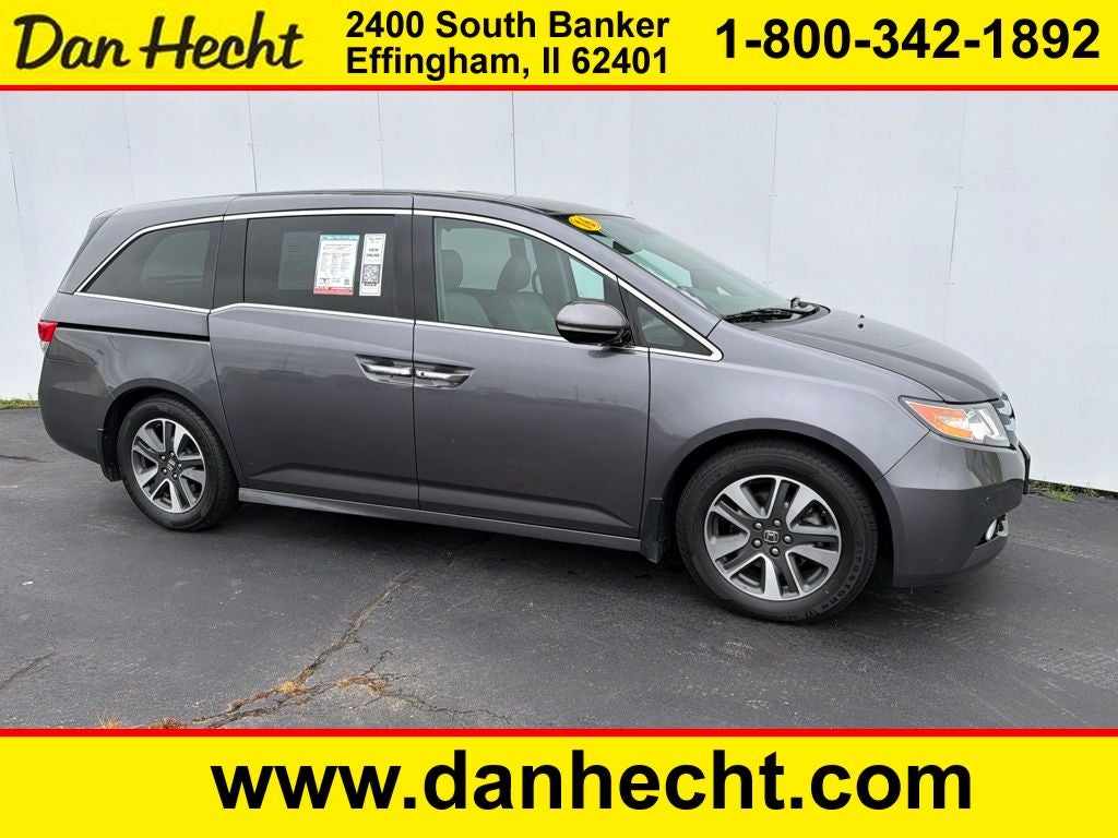 2016 Honda Odyssey Touring Elite in Modern Steel Metallic — front three-quarter view